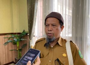 Foto: Kepala Bidang Administrasi Pemerintahan Desa DPMD Kukar, Poino.
